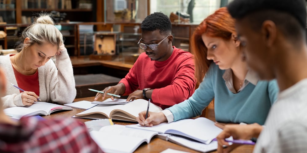 group-of-university-students-studying-together